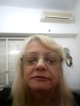 Snapshot of MatureElegantWidow chatting on May 2026 01:14:01 AM MatureElegantWidow online show from May 2026 01:14:01 AM